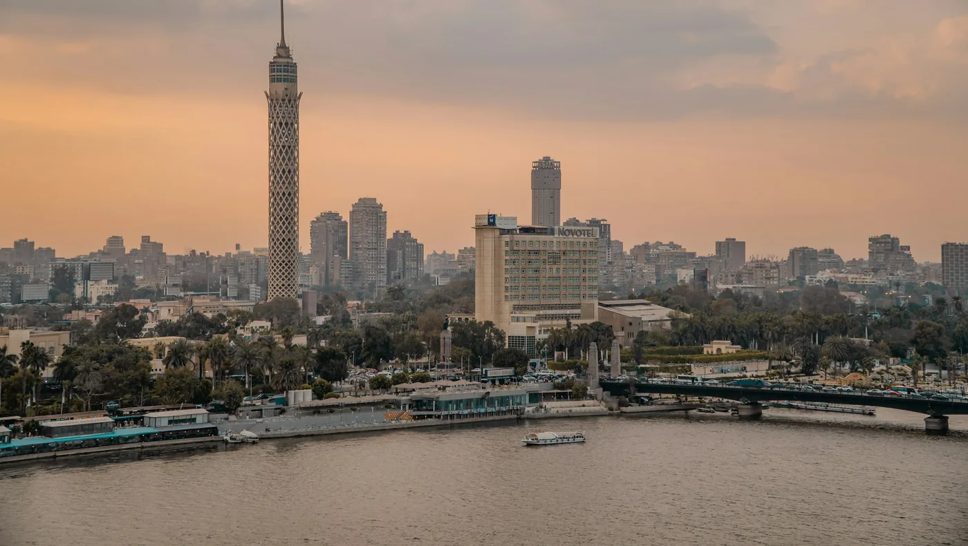The Cairo skyline at dusk, with the Cairo Tower on Gezira Island