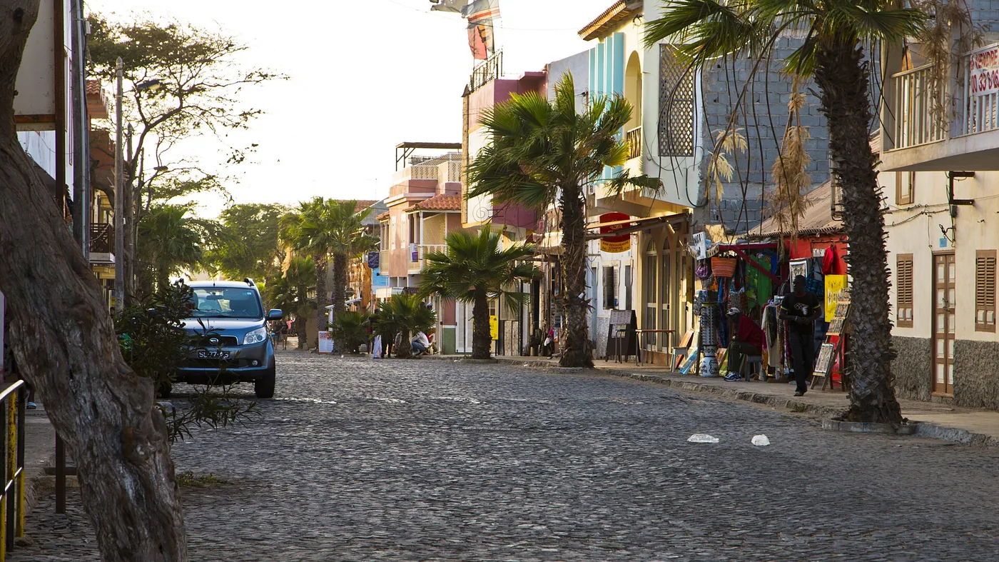 A palm-lined street on the Cabo Verde coast