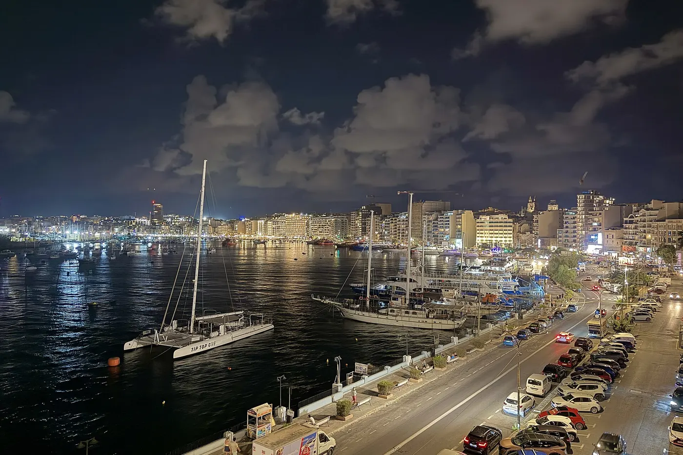 Apartment blocks along the Sliema waterfront, Malta, at night