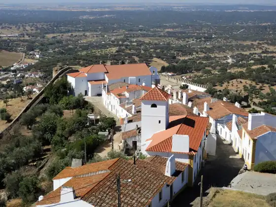 A whitewashed walled hill town above the Alentejo