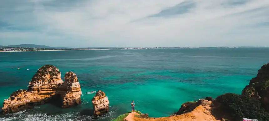Golden cliffs and turquoise water on the Algarve coast near Lagos